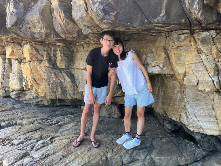 Evan and Yuko checking the height of the wave cut notch, while waiting to be washed away